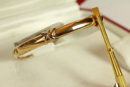 18K CARTIER TRINITY BANGLE D36264 SIZE 16,comes with box and screwdriver total weight 28.8gms.