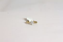 9C,T DIAMOND FLOWER RING , ESTIMATED AT 0.15CT TOTAL,hallmarked, total weight 1.7gms, ring size K.