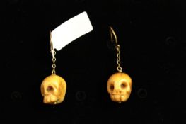 Vintage Bone Skull drop earrings, gold French wire fittings