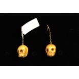 Vintage Bone Skull drop earrings, gold French wire fittings