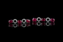 Pair of Ruby and Diamond earrings, set with 6 oval cut rubies totalling 5.85ct, 40 round brilliant