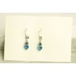 Pair of Topaz and Diamond earrings, set with 4 trilliant cut topaz totalling approximately 3.00ct