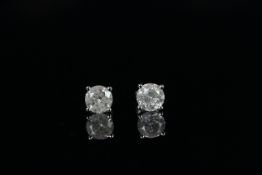 Pair of Diamond stud earrings, set with 2 round brilliant cut diamonds totalling 2.21ct