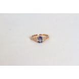 Sapphire and Diamond ring, set with an oval cut Sapphire totalling approximately 1.05ct