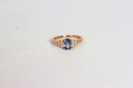 Sapphire and Diamond ring, set with an oval cut Sapphire totalling approximately 1.05ct