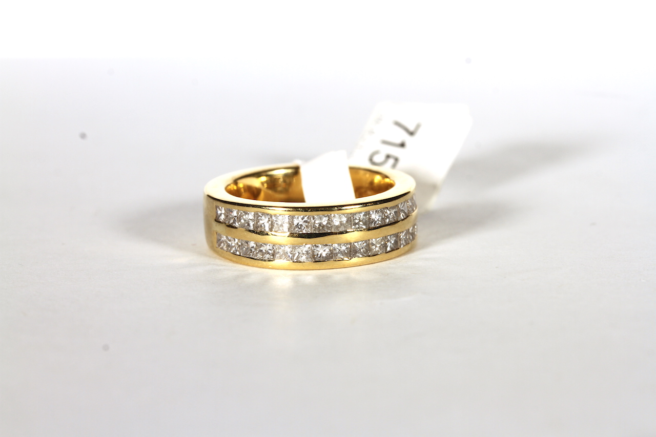 18CT TWO ROW ET RING,ESTIMATED AS 1.25CT TOTAL, total weight 9.93gs, hallmarked, ring size K 1/2.