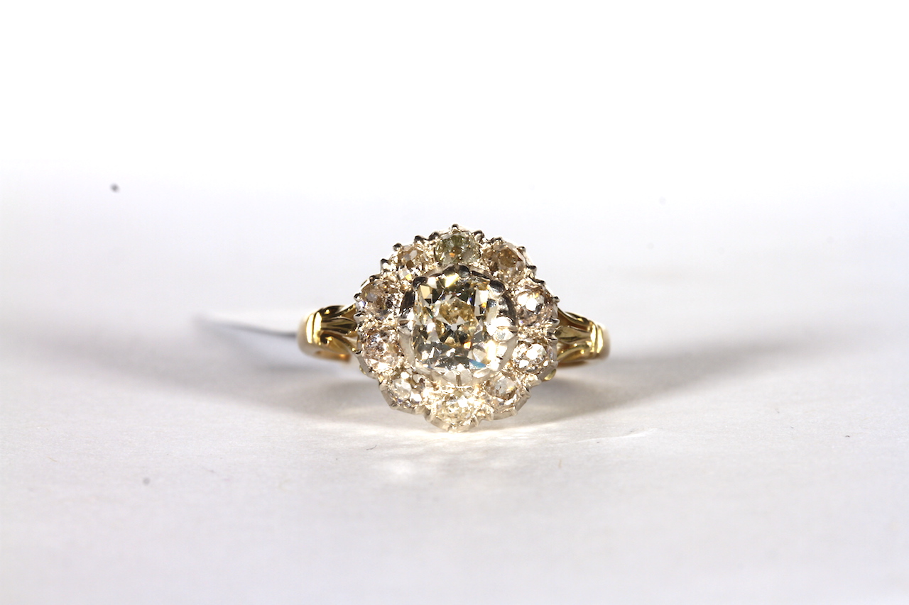 Fine Victorian Old Cut Diamond Ring, central old cushion a cluster of a further 10 old cut diamonds,