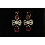 Early 20th Century Garnet and Paste set earrings, white paste stones to bow with a foil backed