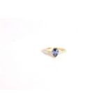 Sapphire and Diamond ring, set with a pear cut natural sapphire totalling approximately 1.05ct