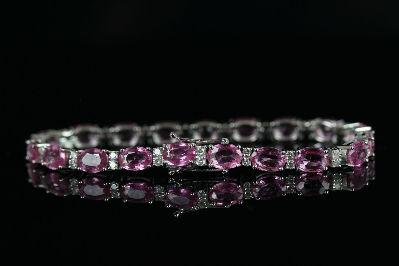 Natural Pink Sapphire and Diamond bracelet, set with 19 oval cut pink sapphires totalling 15.75ct - Image 2 of 3