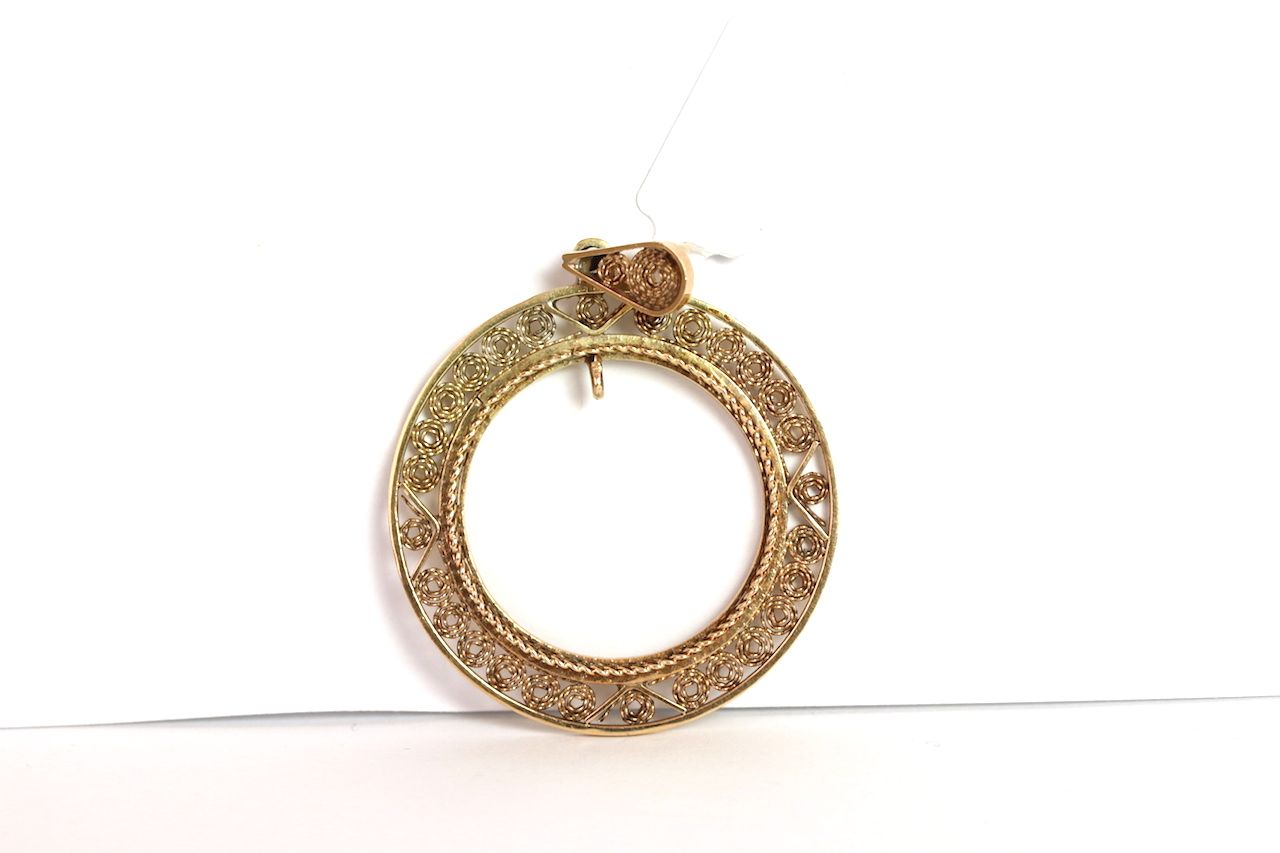 Vintage gold work pendant, circular mount with wire work detail 38mm , tested as 14ct, circa 1930s