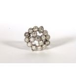18CT WHITE GOLD DIAMOND CLUSTER ESTIMATED AS 1.59CT TOTAL, stones in a chenier setting, total weight