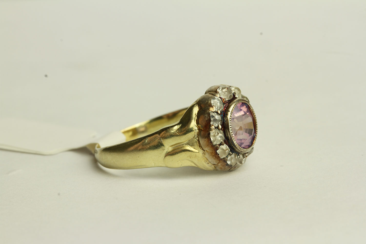 Pink Sapphire and Diamond Ring, set with a centre pink sapphire approximately 1.28ct, surrounded - Image 2 of 3