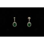 Pair of Emerald and Diamond drop earrings, set with 2 oval cut Emeralds