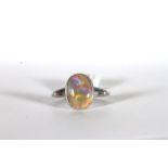 Early 20th Century Black Opal Ring, single oval cabochon of black opal with strong flashes of