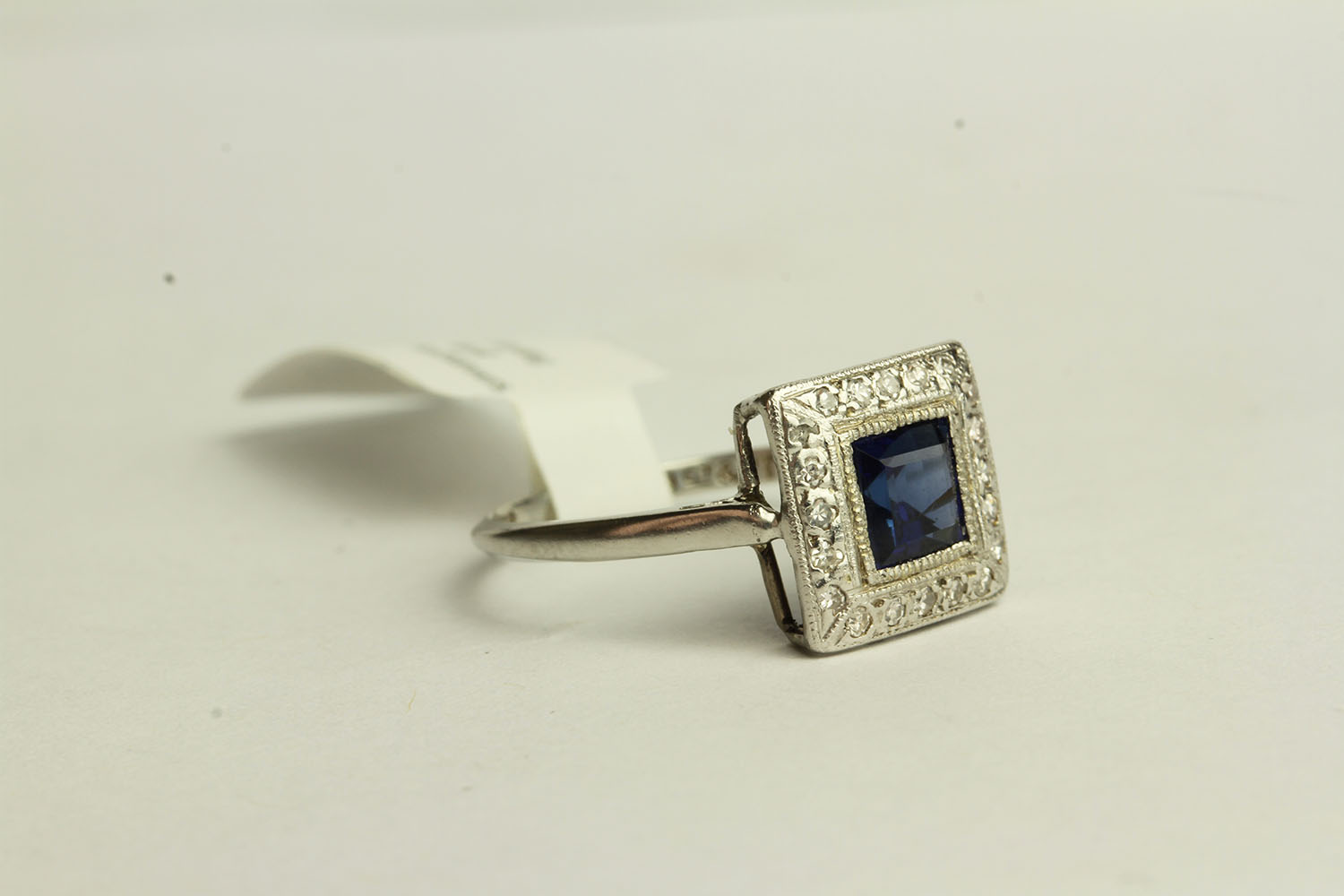 Sapphire and Diamond ring, set with a centre princess cut sapphire approximately 0.93ct, - Image 2 of 3