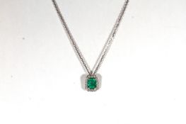 18CT WHITE GOLD EMERALD AND DIAMOND PENDANT, emerald estimated as 5.2 x 5.1mm, diamonds estimated as