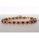 9C RUBY AND DIAMOND TENNIS BRACELET, rubies estimated 3x 2 mm each x 22 stones, diamonds estimated