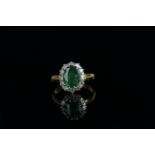 Emerald and Diamond ring, set with 1 oval cut natural emerald approximately 1.90ct