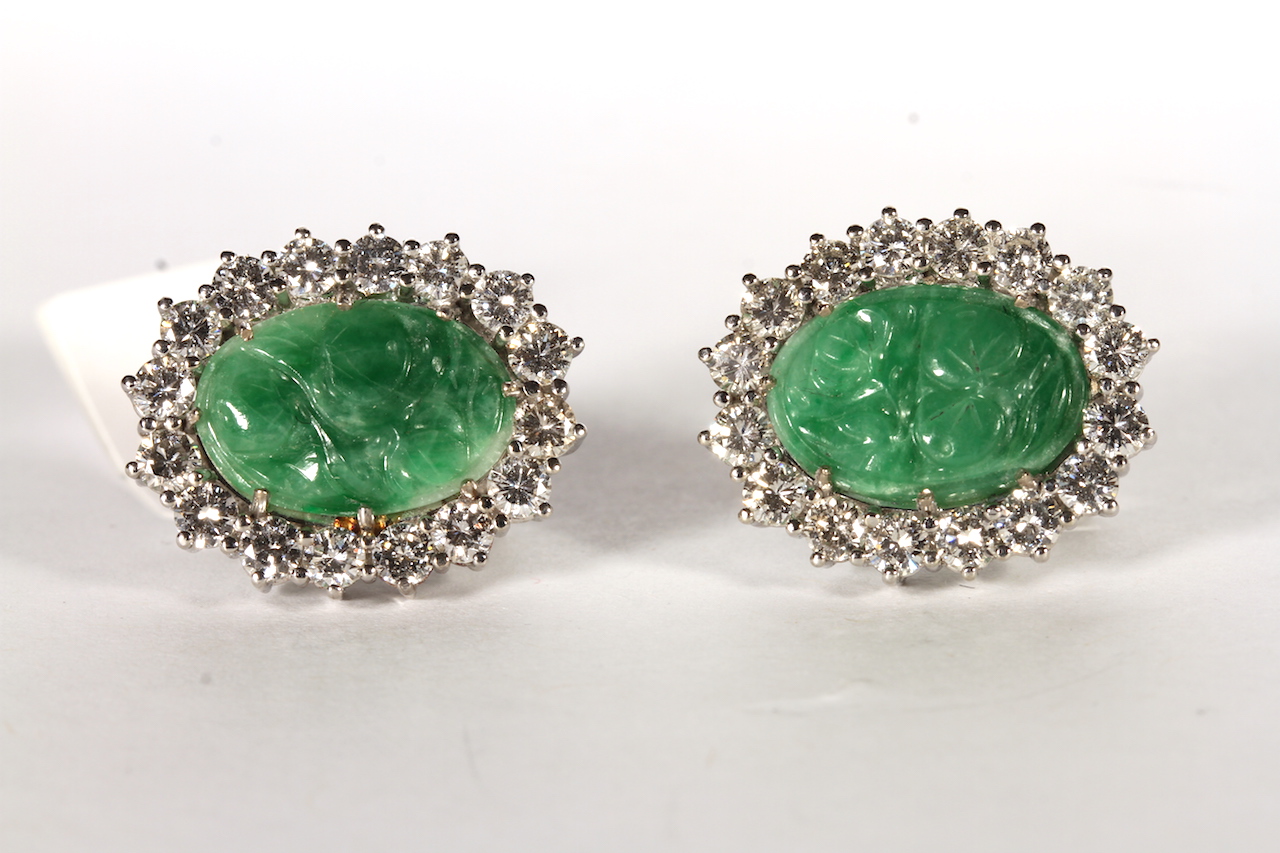 Pair of Jade and Diamond earrings, oval carved jade panels, surrounded by brilliant cut diamonds,,
