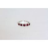 Ruby and Diamond ring, set with 5 round cut rubies totalling approximately 1.12ct
