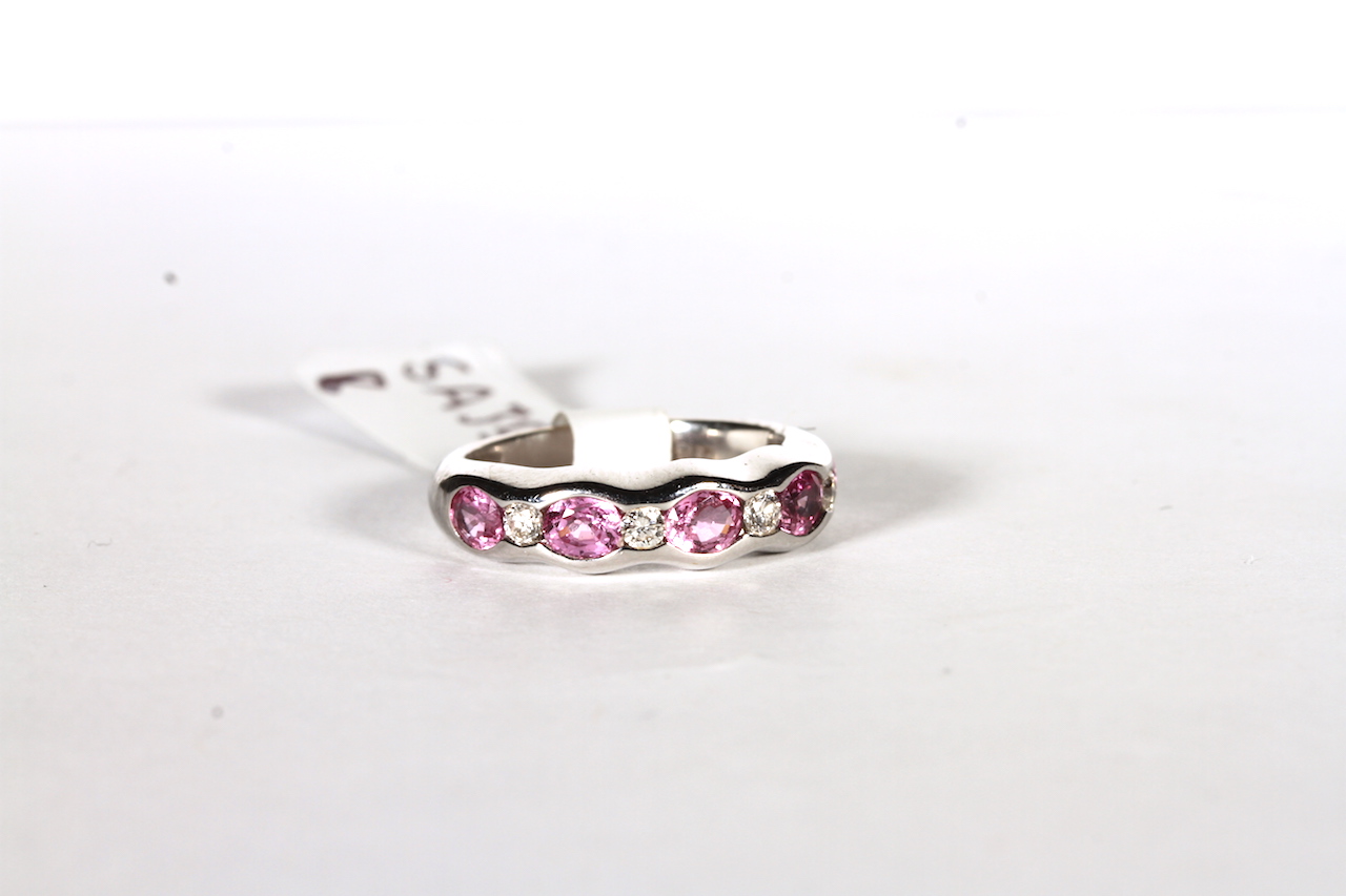 18CT PRAVINS PINK TOURMALINE AND DIAMOND DRESS RING,pink stones estimated as 4x3mm , 4x brilliant