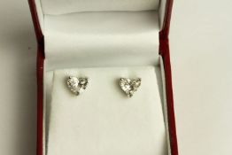 Pair of Heart Shaped Diamond Stud Earrings, set with a total of 2 diamonds