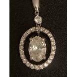 18K WHITE GOLD OVAL DIAMOND CLUSTER PENDANT , CENTRE STONE ESTIMATED AS 0.72CT WITH A DIAMOND