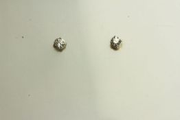 Pair of Diamond Stud Earrings, set with a total of 2 round brilliant cut diamonds