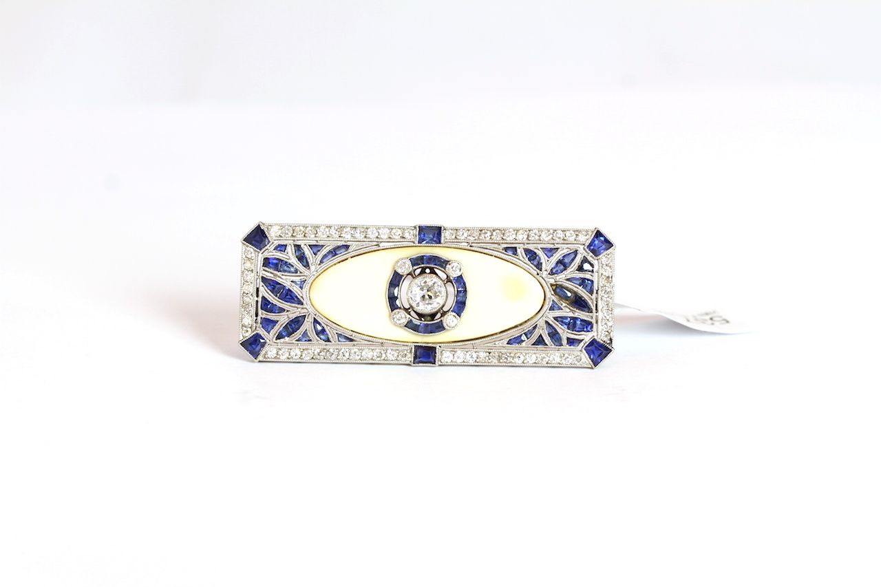 Fine Art Deco Diamond, Sapphire and Ivory Brooch, a single old cut diamond to centre within a
