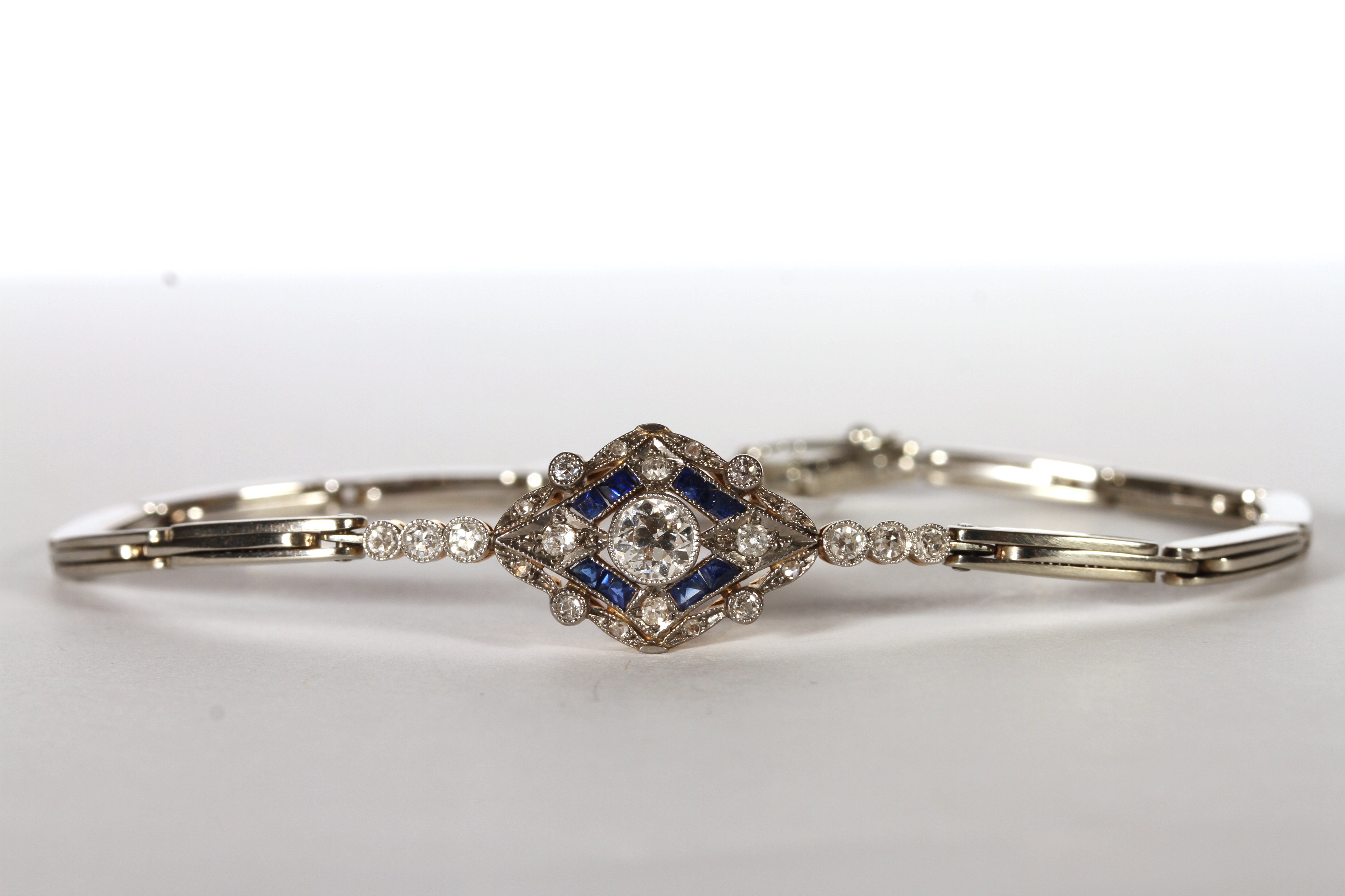 Diamond and Sapphire bracelet, set with diamonds estimated total 0.65ct, set with 8 sapphires,