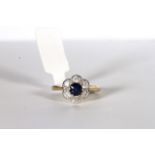 Sapphire and Diamond Flower Ring, set with a sapphire approximately 0.72ct, surrounded by 6 diamonds