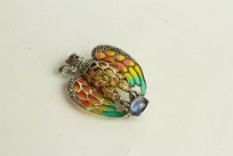 Eagle Brooch Pendant, set with a cabochon cut sapphire, ruby eye