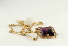 Modernist Amethyst 18ct necklace, large diamond cut Amethyst mounted within 18ct wire work frame,