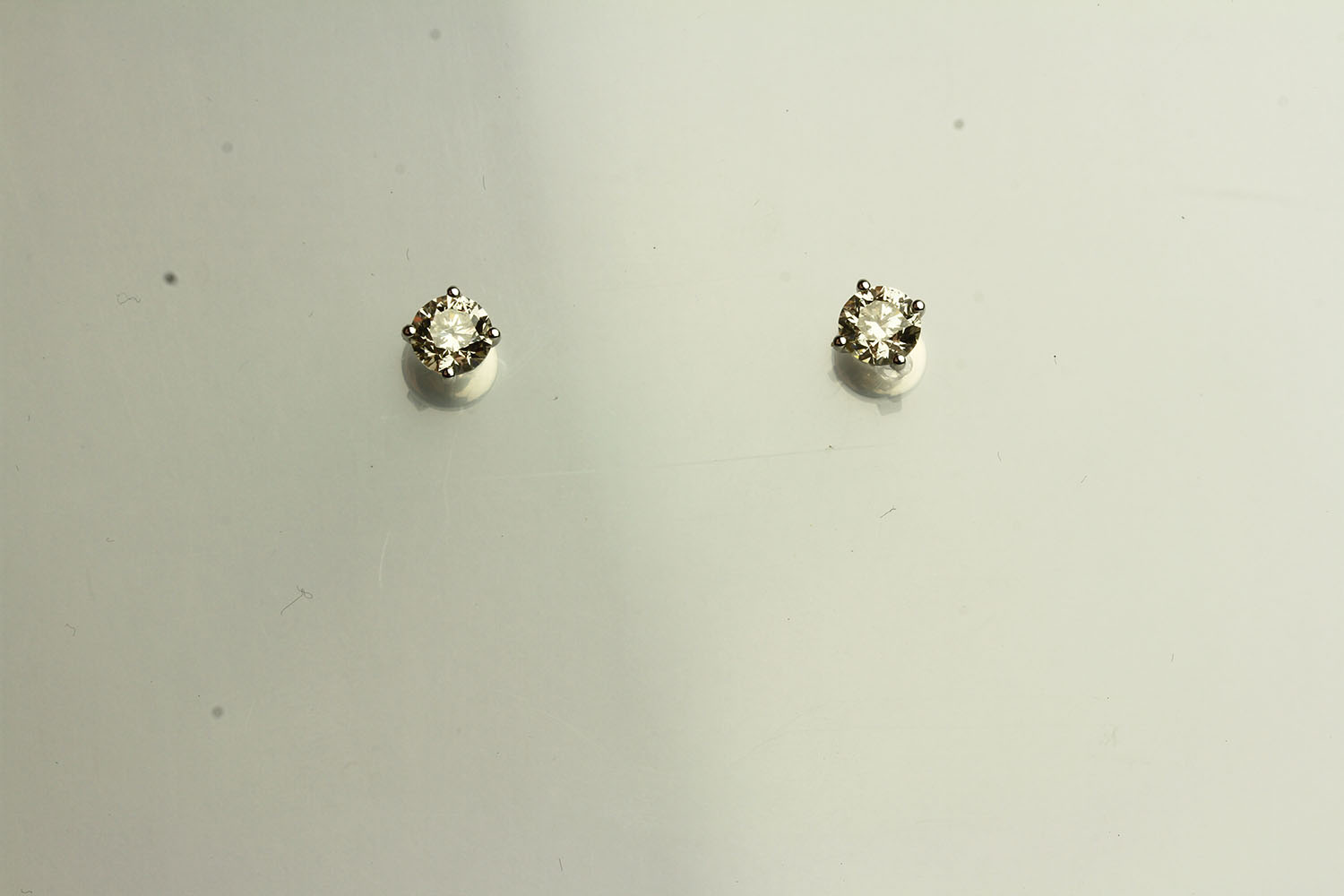 Pair of Diamond Stud Earrings, set with a total of 2 round brilliant cut diamonds