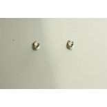 Pair of Diamond Stud Earrings, set with a total of 2 round brilliant cut diamonds