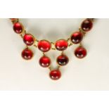 Victorian 15ct Cabochon Amber Necklace, graduating cabochon cut stones, foil backed, tested as