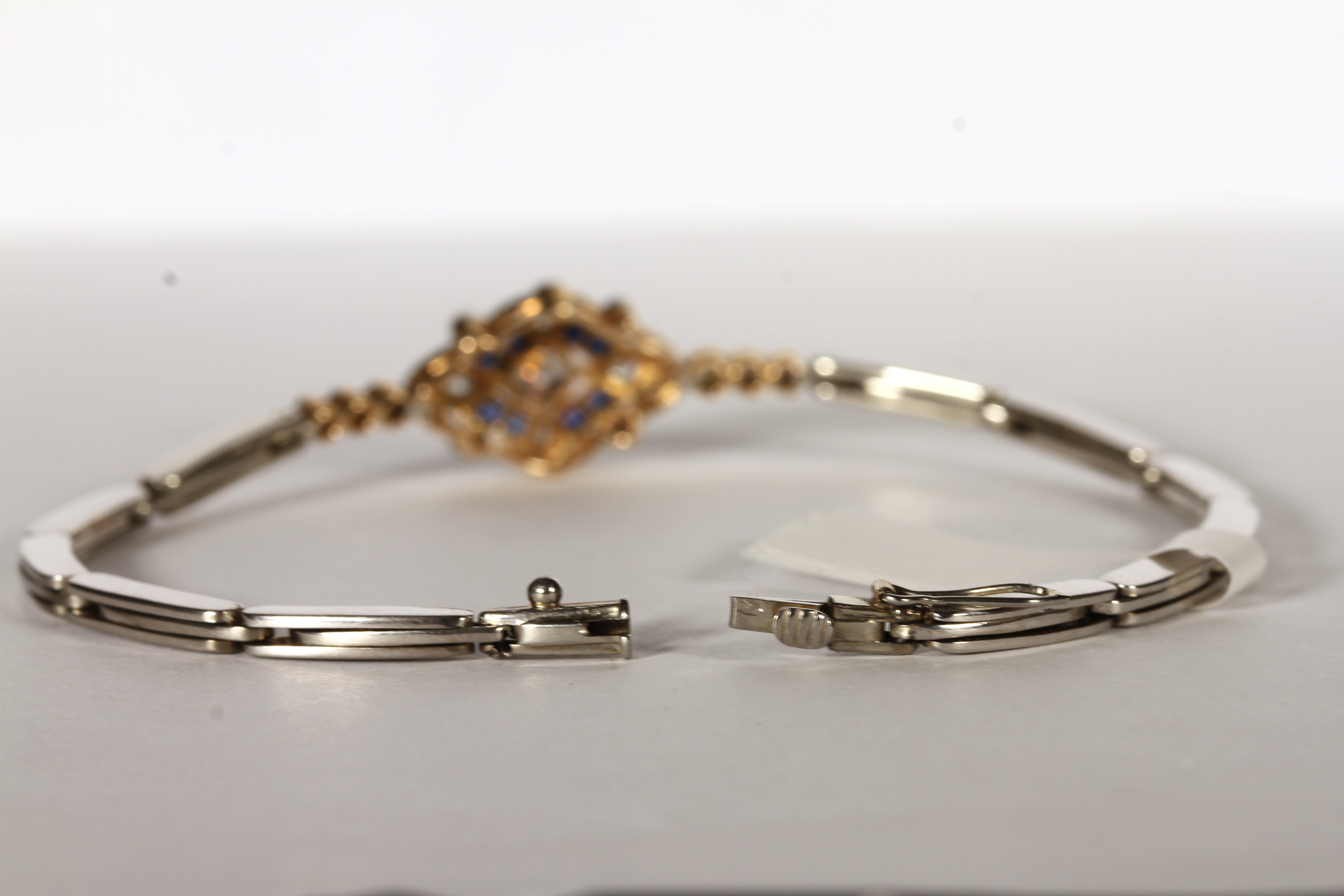 Diamond and Sapphire bracelet, set with diamonds estimated total 0.65ct, set with 8 sapphires, - Image 2 of 2