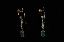 Pair of Blue Topaz and Diamond Drop Earrings, set with a total of 2 topaz stones and 10 diamonds,