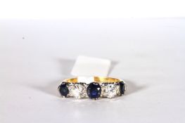 Sapphire and Diamond 5 stone ring, set with 3 sapphires totalling approximately 1.26ct, set with 2