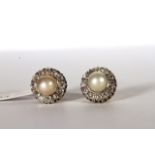 Pearl and Old Cut Diamond stud earrings, central 7mm pearl within a border of old cut diamonds, 12.