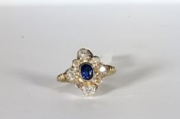 Sapphire and Diamond Ring, set with an oval cut sapphire approximately 0.63ct, surrounded by 8