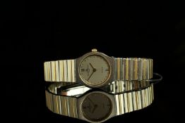 LADIES BAUME & MERCIER TWO TONE DRESS WATCH,round, silver dial with sword gold hands, gold dot