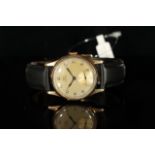 GENTLEMENS OMEGA 9CT GOLD 30T2 WRISTWATCH CIRCA 1943, circular patina gold dial with black Arabic