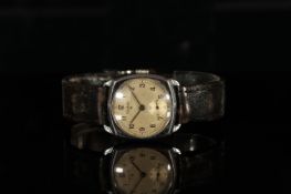 GENTLEMANS VINTAGE AUDAX, BEING SOLD WITHOUT RESERVE,square case, silver dial with black hands,