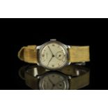 GENTLEMENS LONGINES CALATRAVA WRISTWATCH, circular patina silver dial with black arabic numerals and