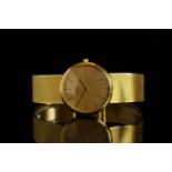 GENTLEMANS VINTAGE UNIVERSAL , round, gold dial and gold hands, gold baton markers,non date, 30mm