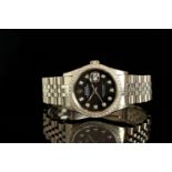 GENTLEMAN'S ROLEX DATEJUST DIAMOND SET , MODEL 16234,SN K61...., CIRCA 2001, round, black dial