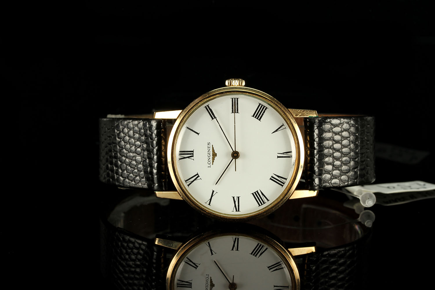 GENTLEMENS LONGINES 9CT GOLD WRISTWATCH, circular white dial with black roman numerals and hands,