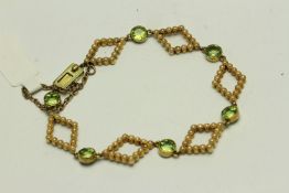 Peridot and Pearl Bracelet, size round cut Peridot stones, spaced with diamond pearl set panels, all